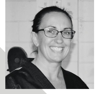 black and white headshot of female dojo owner, Annette Baker
